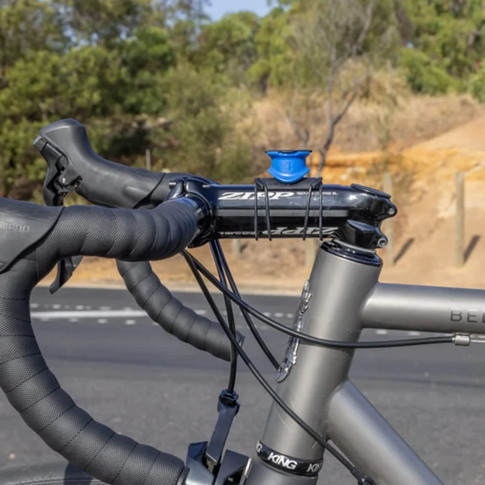 QUAD LOCK Soporte para Tija o Manillar de Bicicleta para teléfonos iPhone y Samsung Galaxy